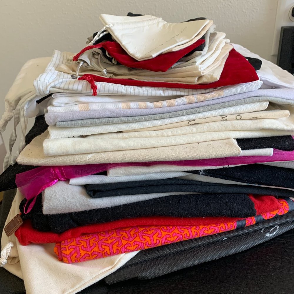 Variety of jewelry, shoe and purse dust cover bags